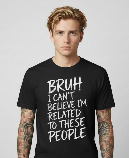 Person wearing a black t-shirt with text on a plain background