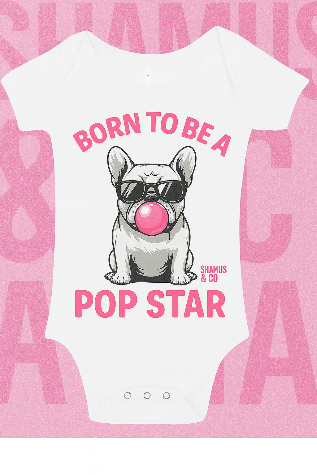 White baby onesie with a dog graphic and text on a pink background