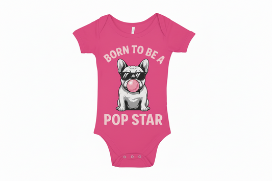 Pink baby onesie with a dog graphic and text on a white background