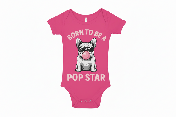 Pink baby onesie with a dog graphic and text on a white background