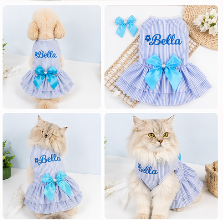 Pet dress with 'Bella' puff and blue bows on a light background