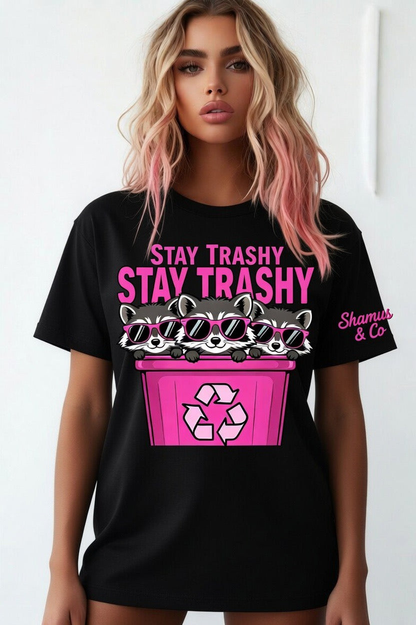 Adult Shamus & Co Stay Trashy graphic T-shirt featuring a raccoon design, casual and stylish for everyday wear.