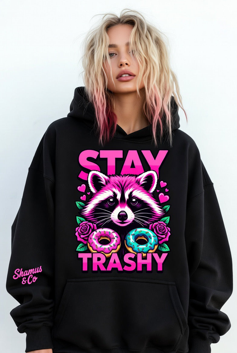 Hot pink Stay Trashy Raccoon oversized hoodie for adults by Shamus & Co, featuring a playful raccoon graphic on soft fabric.