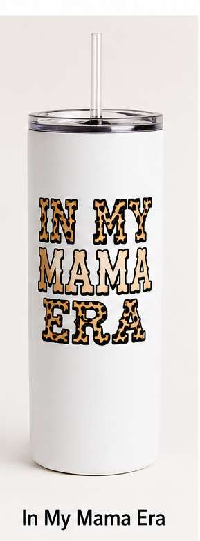 White tumbler with 'IN MY MAMA ERA' text on a light gray background