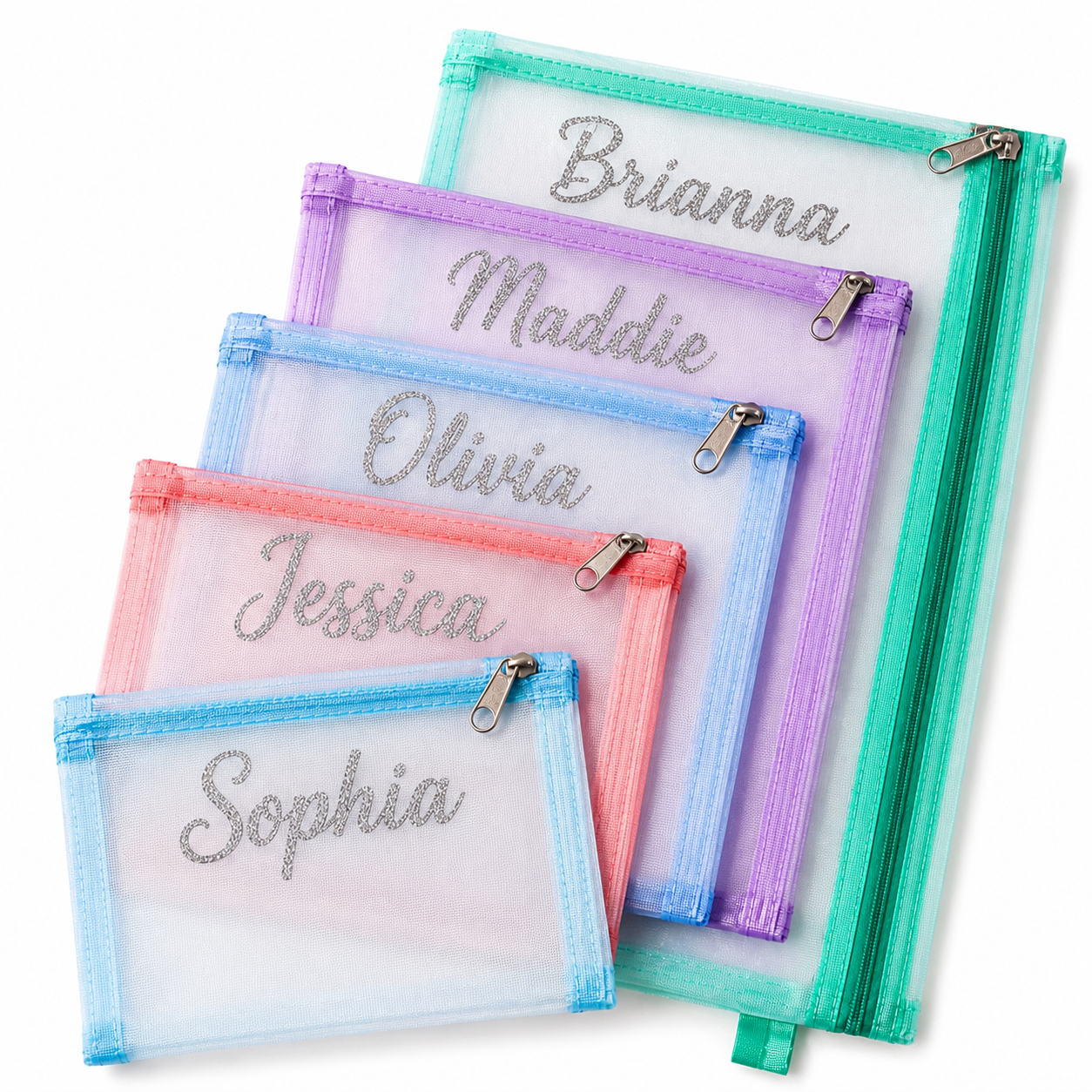 Five personalized mesh zippered pouches in pastel colors, arranged in a fan shape on a white background. The pouches are light blue, coral pink, light blue, lavender, and mint green, each customized with a silver glitter script name (Sophia, Jessica, Olivia, Maddie, Brianna).