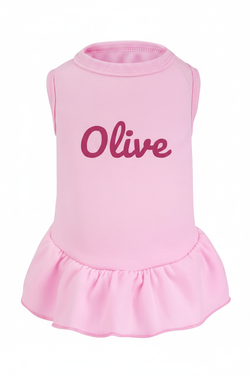 Pink custom dog dress from Shamus & Co, personalized pet apparel with your pet's name, soft fabric and stylish design.