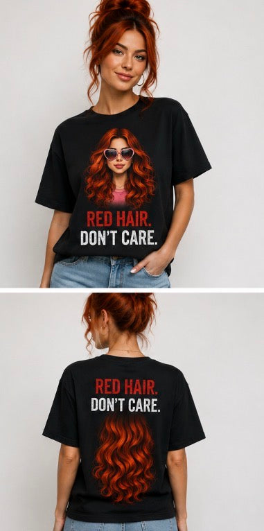 A model with red hair is shown wearing a black graphic t-shirt in a split front and back view. The shirt features a graphic of a woman with long red hair and sunglasses, with the text 'RED HAIR.