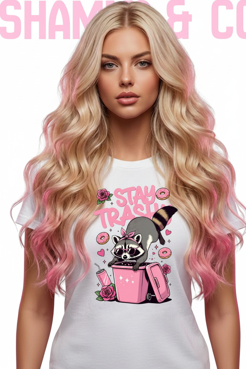 Woman wearing a white t-shirt with a graphic design and 'Shampoo & Co' branding.