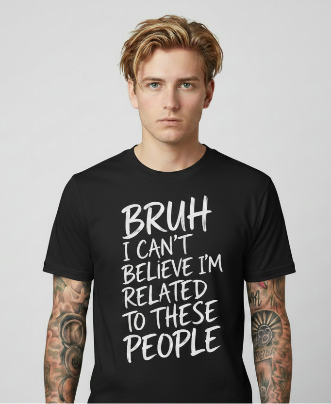 Person wearing a black t-shirt with text on a plain background