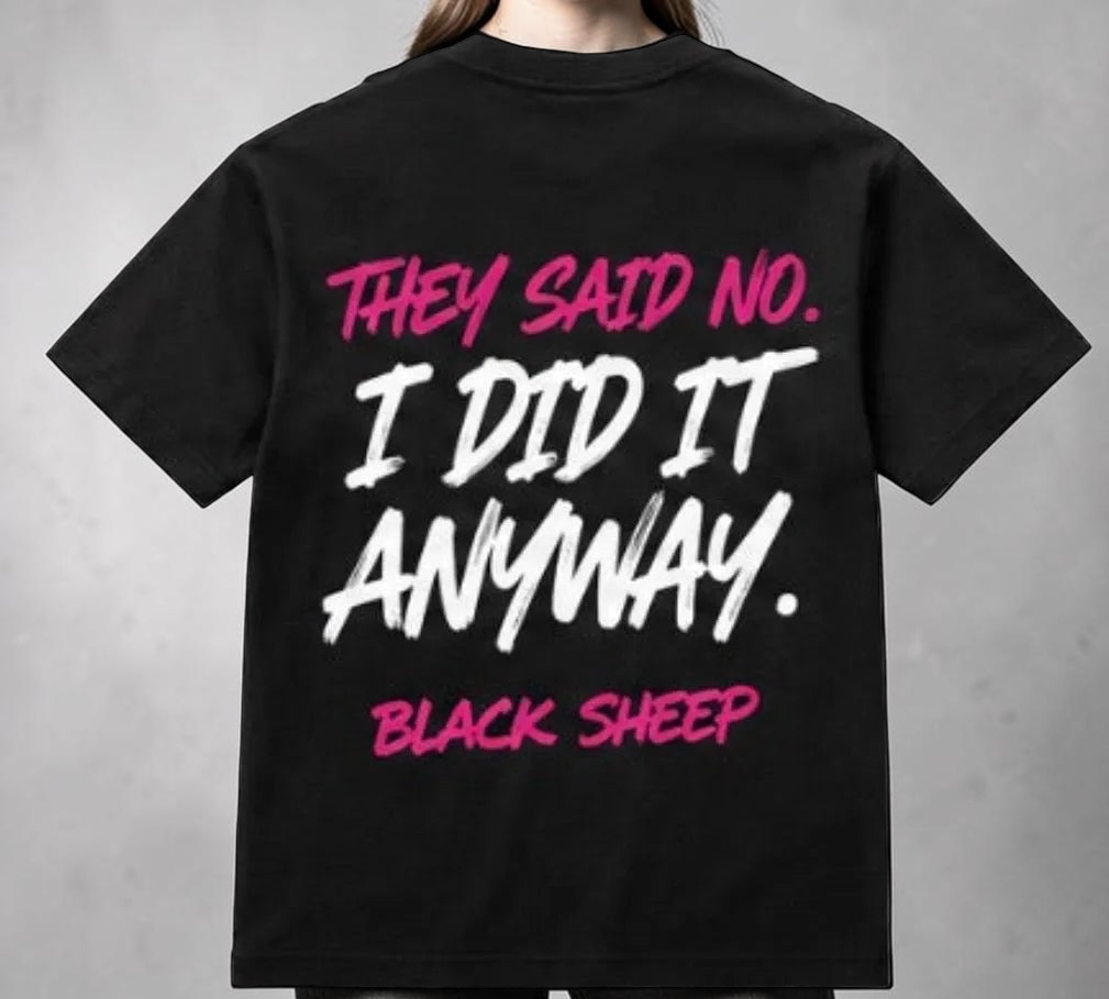 Black Sheep™ Motivational Graphic T-Shirt by Shamus & Co featuring a bold black sheep design on adult streetwear tee
