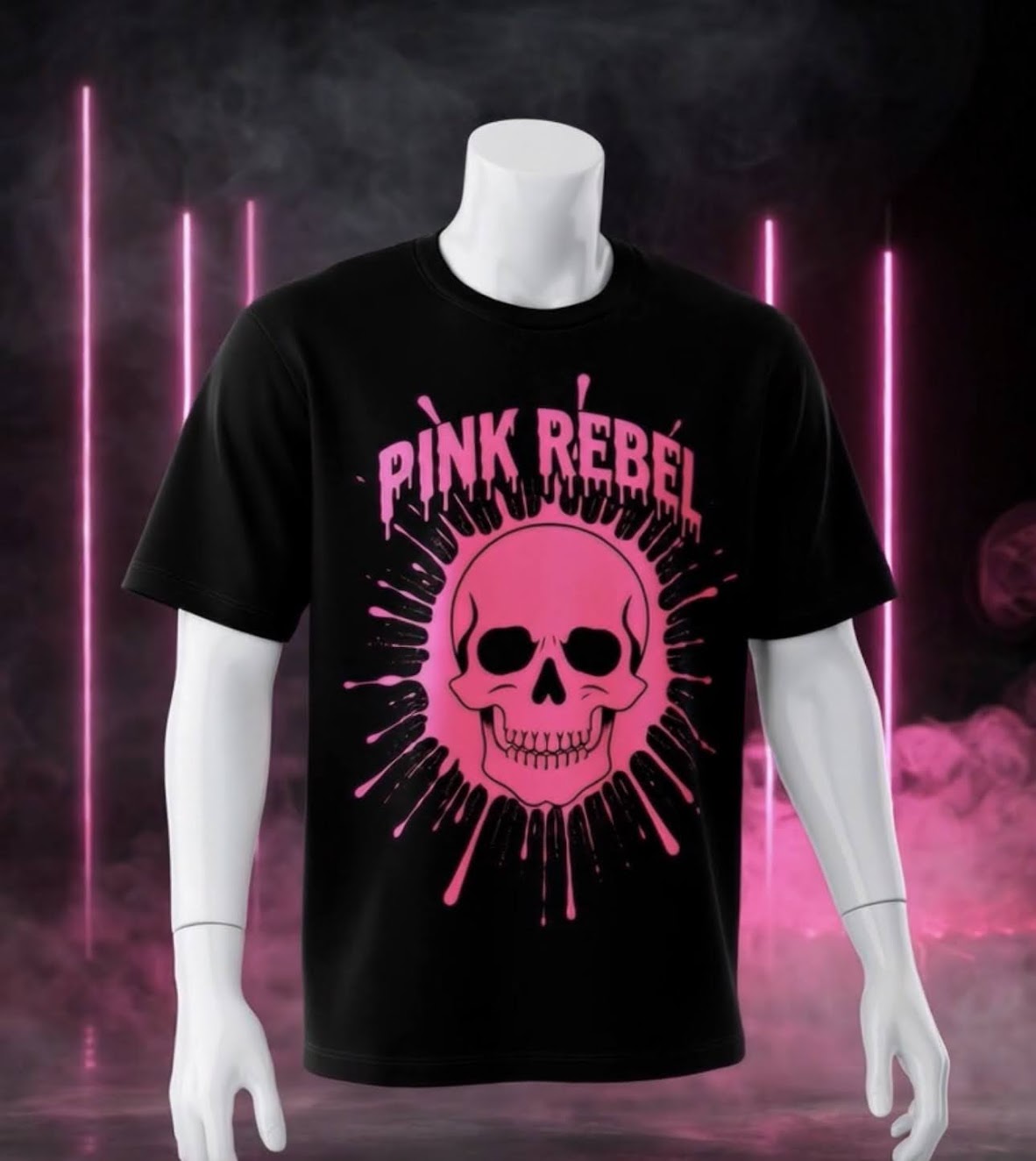 Black adult t-shirt featuring a vibrant hot pink dripping skull graphic and the words Pink Rebel in a gritty paint-drip font, displayed on a white male mannequin with neon pink light tubes in the background.
