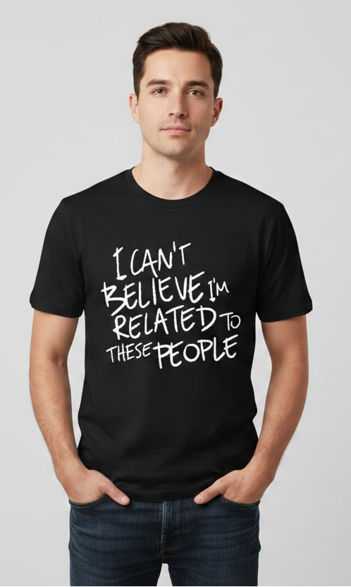 Man wearing a black t-shirt with text on a gray background